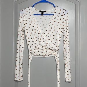 White flowered wrap around top